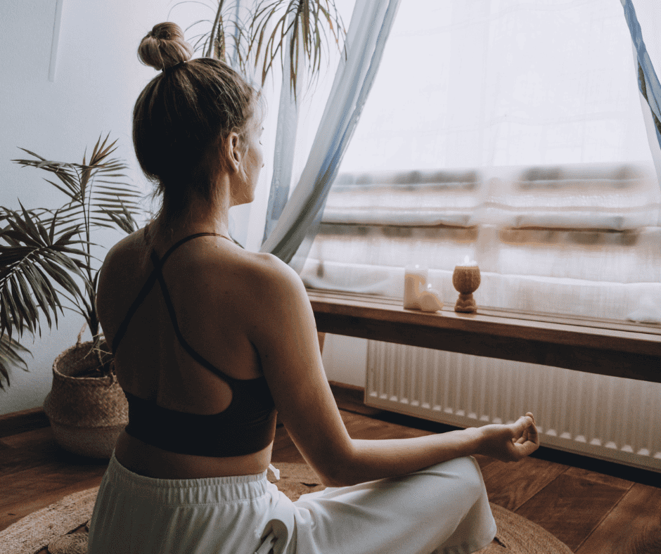 Close Up of Woman Meditating Indoors